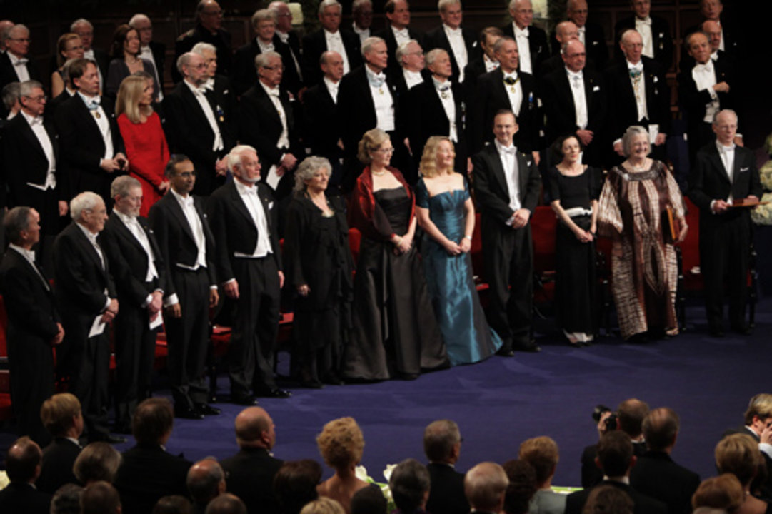The 2009 Nobel Laureates stand for the Swedish national anthem