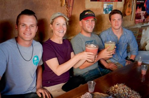 Enjoying chicha with William, James and Joseph, Peru,