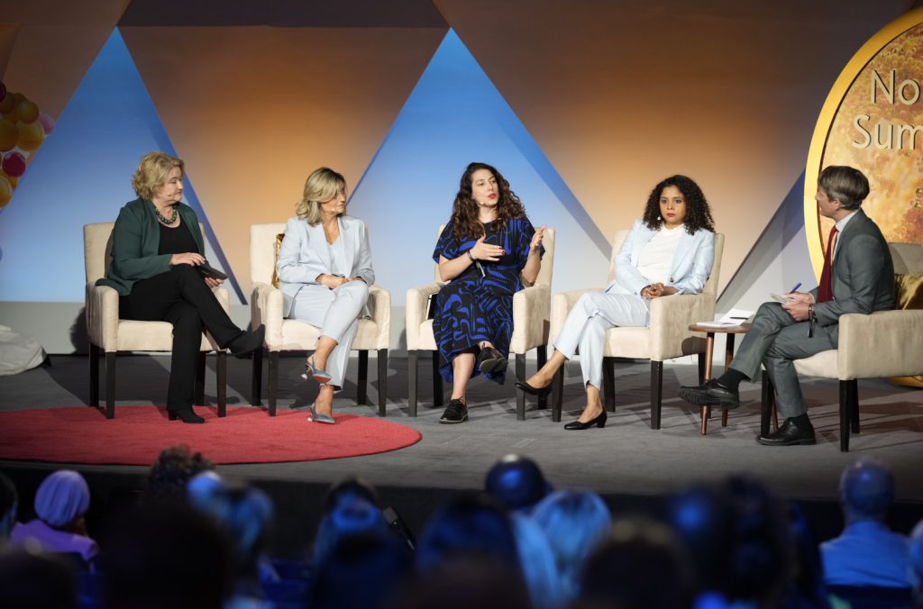 A panel on stage at the Nobel Prize Summit