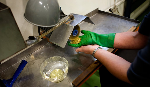 The medal is polished to get rid of oxides