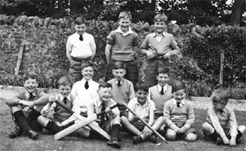 Kneeling in the middle of the middle row with 11 of my Melville College classmates on my 11th birthday.